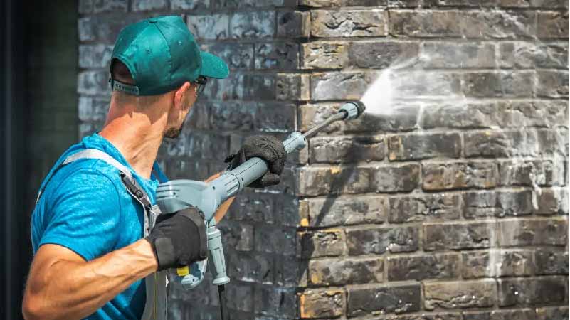 Pressure Washing Brick Wall